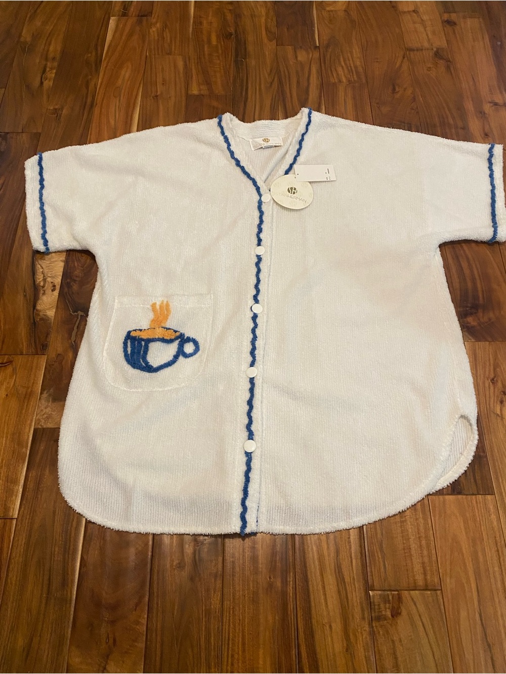 White Short-Sleeve Plush Robe with Blue Trim and Cup Patch